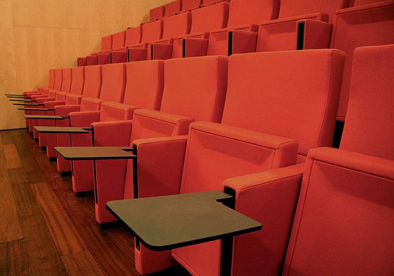 Prima auditorium seating with lecture tables