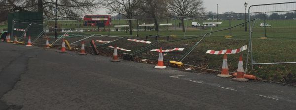 heras style fence panels blown over