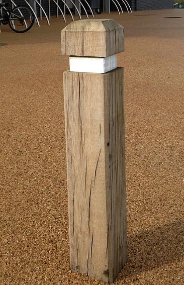 square wooden bollard with reflective banding
