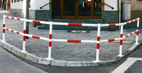 urban red and white steel railing system in town